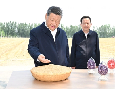李强会见韩国总理金民锡